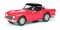 Triumph TR5 s uzavřenou střechou, červená